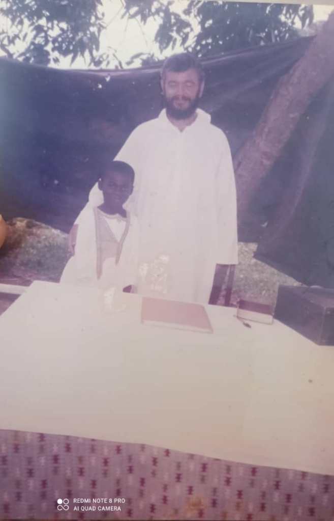 Don Gianni e il piccolo Blaise Desiré